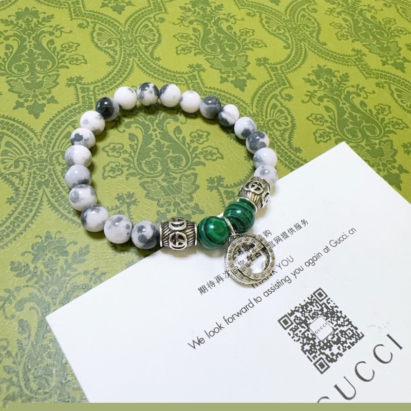 G*u*i bracelets